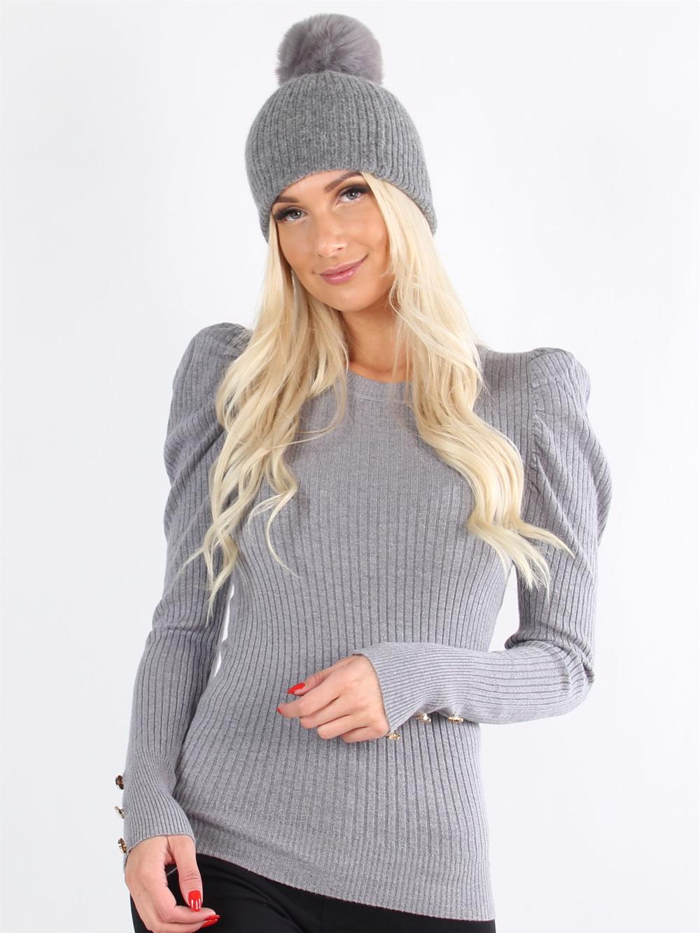 Arrow - Svart feminin stickad blus med puffärmar och guldknappar